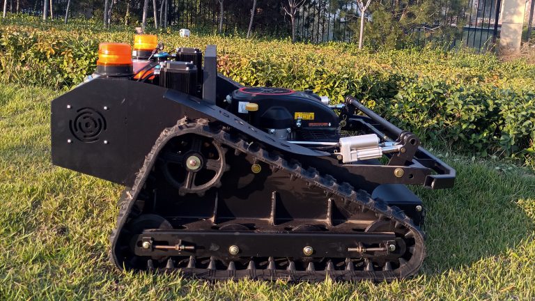 remotely controlled tracked brush mower with snow plow snow blade snow shovel snow removal machine