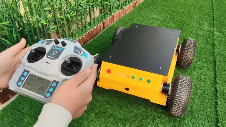 remote controlled rubber track lawn mower with snow plow snow blade snow shovel snow removal machine