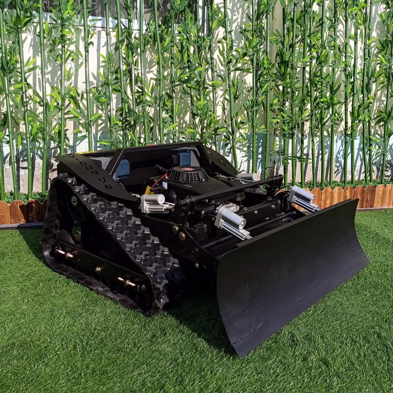 remotely controlled mower with snow plow snow blade snow shovel snow removal machine