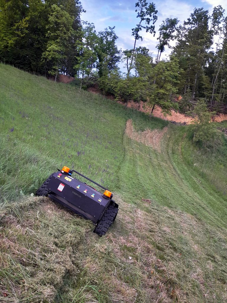 emotely controlled track cutting grass machine made by Vigorun Tech