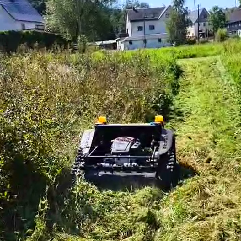 remote operated caterpillar lawn cutter machine made by Vigorun Tech